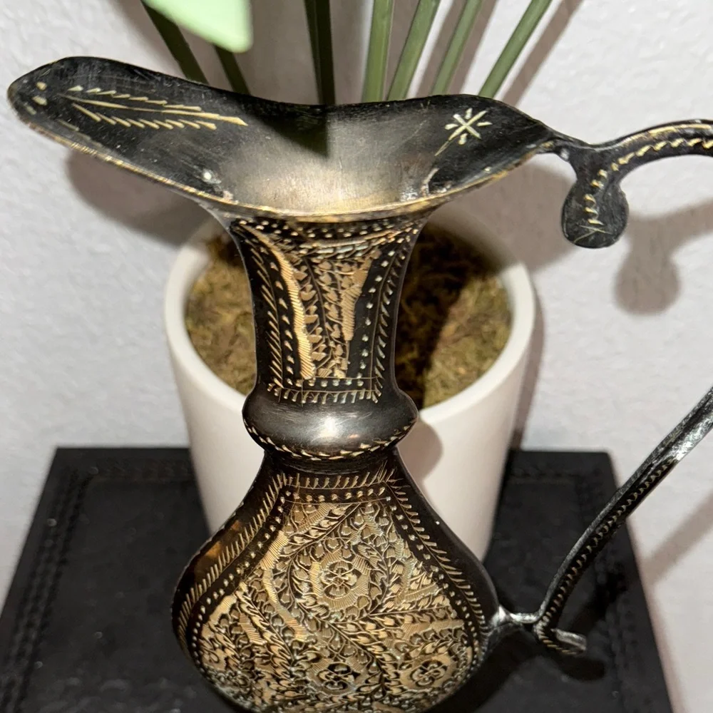 This is a‎ vintage decorative etched brass pitcher or ewer.
